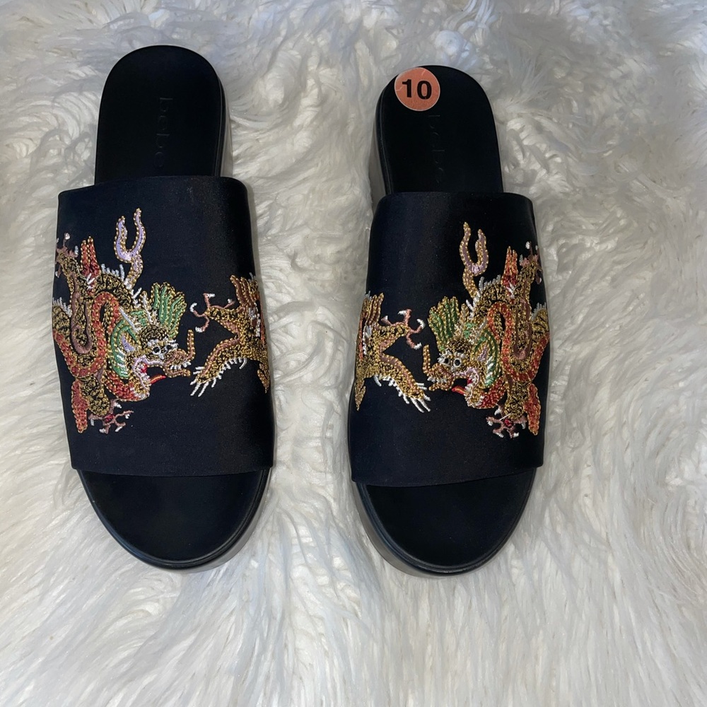 Bebe embroidered dragon platform slip ons